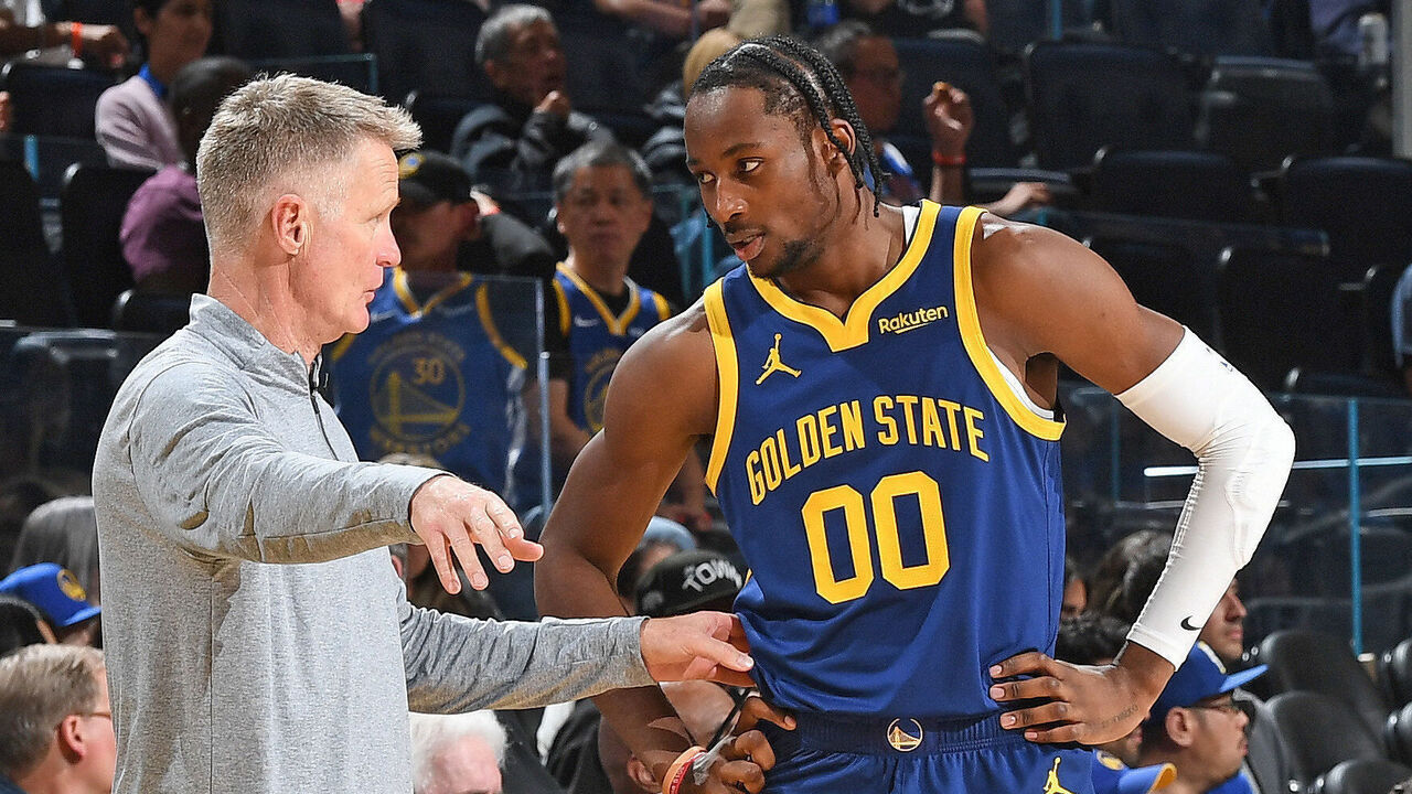 SAN FRANCISCO, CA - NOVEMBER 16: Jonathan Kuminga #00 and Head Coach Steve Kerr of the Golden State Warriors look on during the game against the Oklahoma City Thunder on November 16, 2023 at Chase Center in San Francisco, California. NOTE TO USER: User expressly acknowledges and agrees that, by downloading and or using this photograph, user is consenting to the terms and conditions of Getty Images License Agreement. Mandatory Copyright Notice: Copyright 2023 NBAE