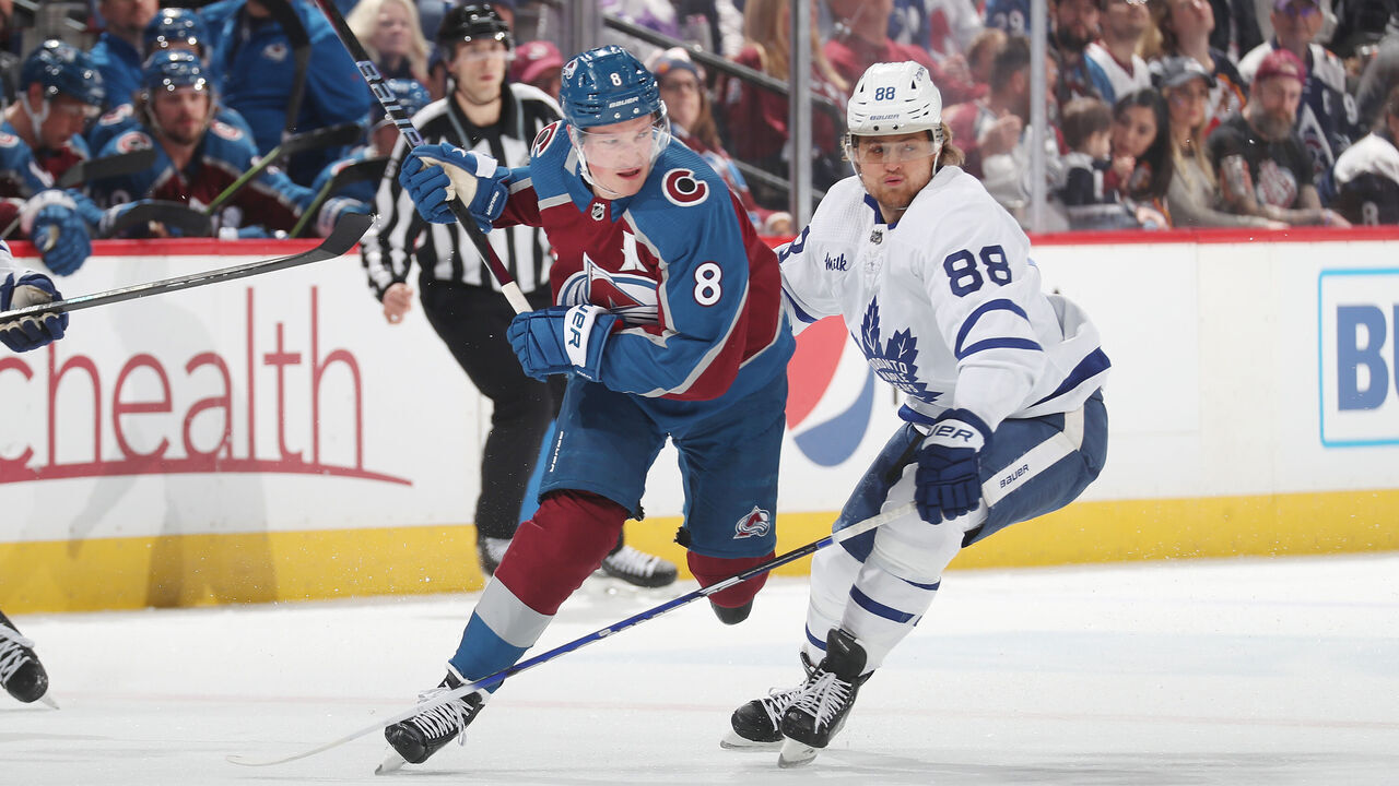 DENVER, COLORADO - DECEMBER 31: Cale Makar #8 of the Colorado Avalanche skates against William Nylander #88 the Toronto Maple Leafs at Ball Arena on December 31, 2022 in Denver, Colorado.