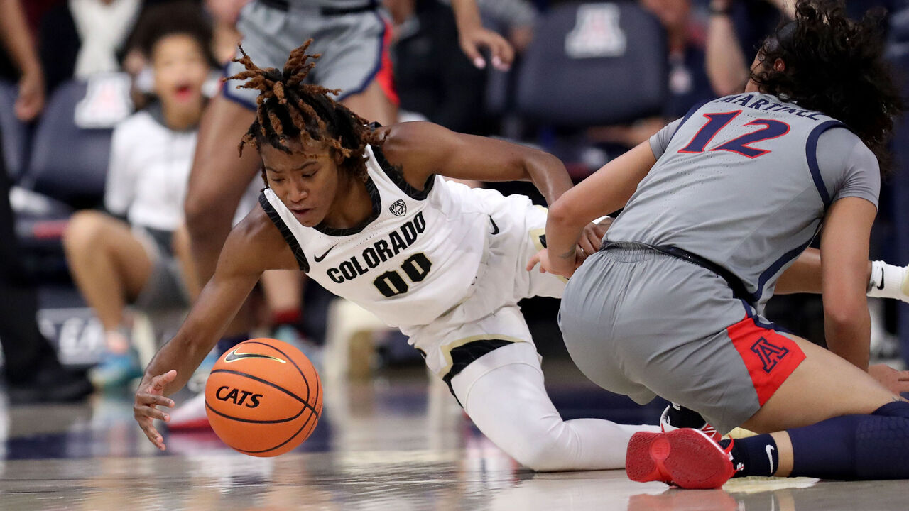 TUCSON, AZ - JANUARY 05: Colorado Buffaloes guard Jaylyn Sherrod #0 fights for a loose ball during the first half of a women's basketball game between the Colorado Buffaloes and the University of Arizona Wildcats on January 5, 2024 at McKale Center in Tucson, AZ.