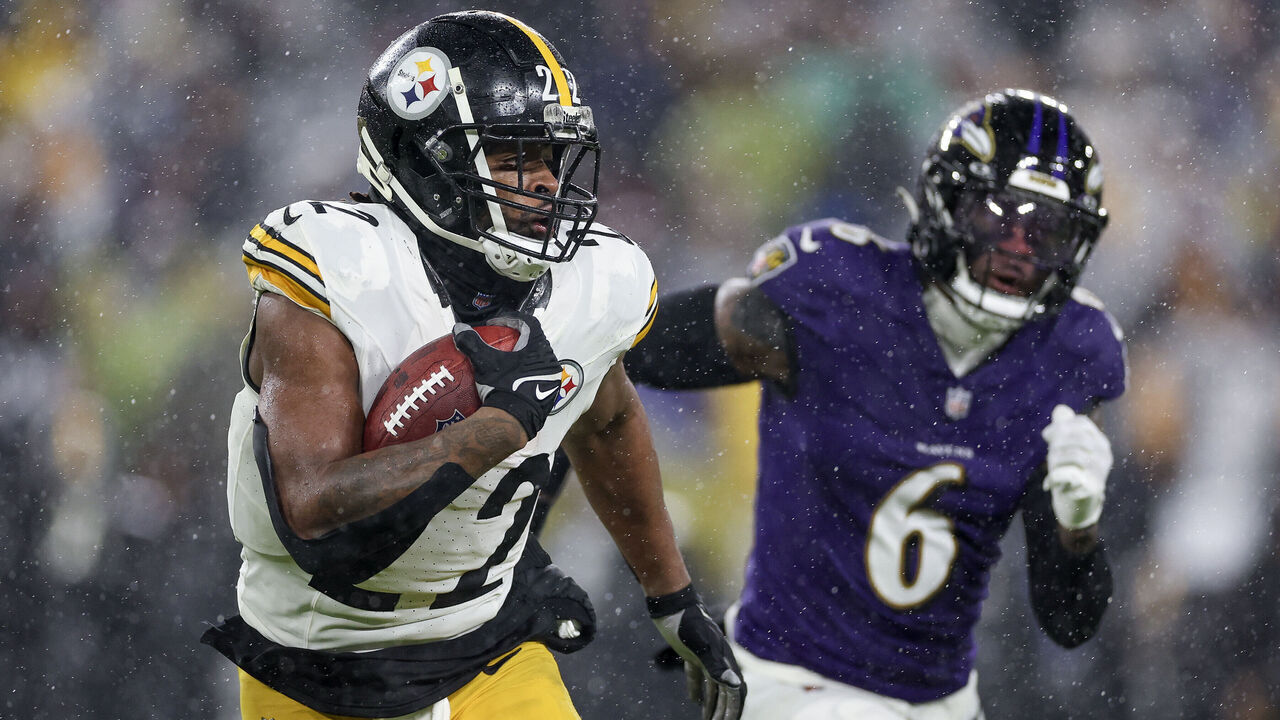 BALTIMORE, MARYLAND - JANUARY 06: Najee Harris #22 of the Pittsburgh Steelers runs the ball up the field in the second quarter of a game against the Baltimore Ravens at M&T Bank Stadium on January 06, 2024 in Baltimore, Maryland.