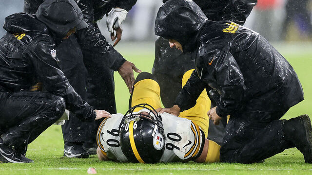 BALTIMORE, MARYLAND - JANUARY 06: T.J. Watt #90 of the Pittsburgh Steelers is looked at by medical staff after an injury during the second half of a game against the Baltimore Ravens at M&T Bank Stadium on January 06, 2024 in Baltimore, Maryland.