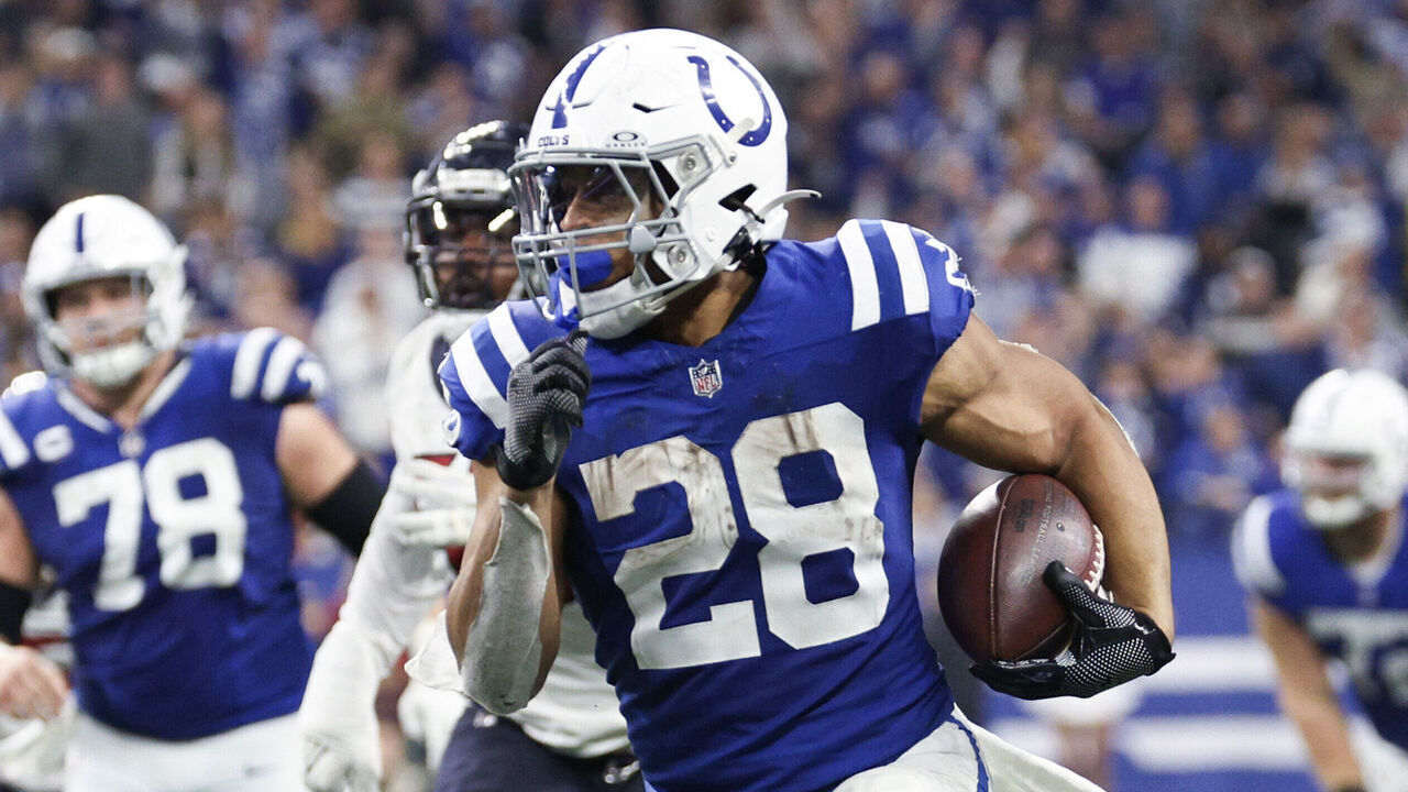 INDIANAPOLIS, INDIANA - JANUARY 06: Jonathan Taylor #28 of the Indianapolis Colts runs with the ball during the third quarter against the Houston Texans at Lucas Oil Stadium on January 06, 2024 in Indianapolis, Indiana.