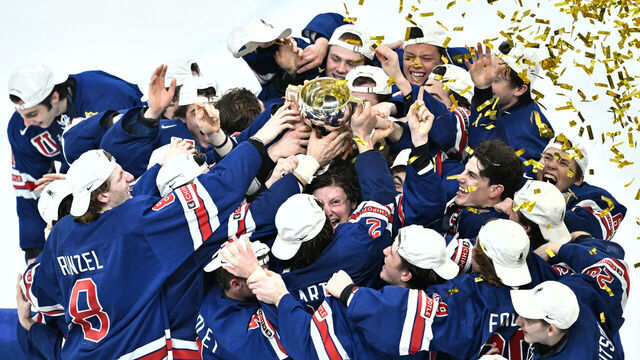 TOPSHOT - USA's players celebrate with the trophy after winning the final ice hockey match between USA and Sweden of the IIHF World Junior Championship in Gothenburg, Sweden on January 5, 2024.