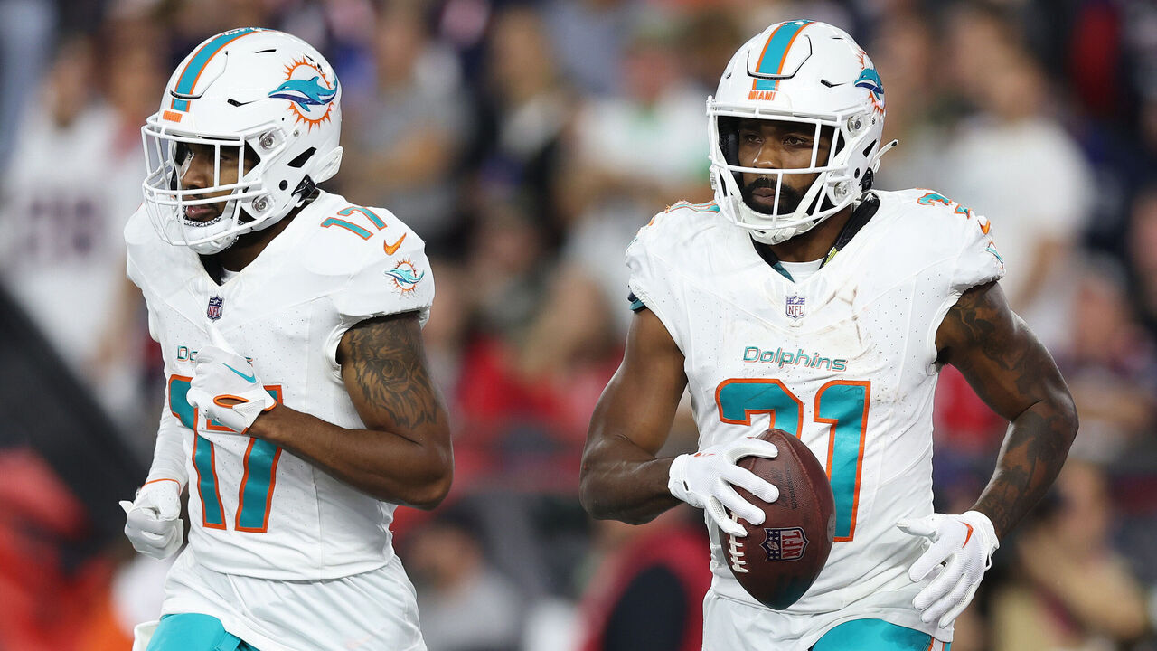 FOXBOROUGH, MASSACHUSETTS - SEPTEMBER 17: Jaylen Waddle #17 and Raheem Mostert #31 of the Miami Dolphins react during the game against the New England Patriots at Gillette Stadium on September 17, 2023 in Foxborough, Massachusetts.