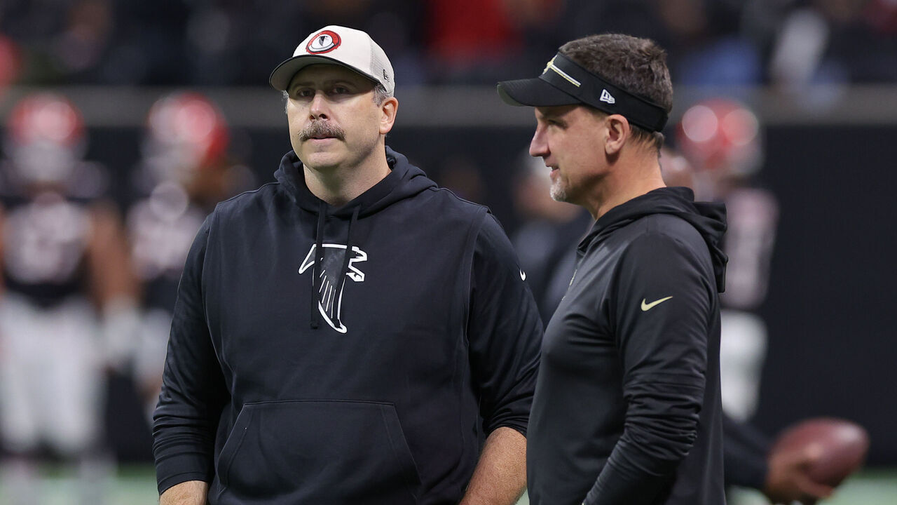 ATLANTA, GEORGIA - NOVEMBER 26: Head coach Arthur Smith of the Atlanta Falcons speaks with head coach Dennis Allen of the New Orleans Saints before the game at Mercedes-Benz Stadium on November 26, 2023 in Atlanta, Georgia.