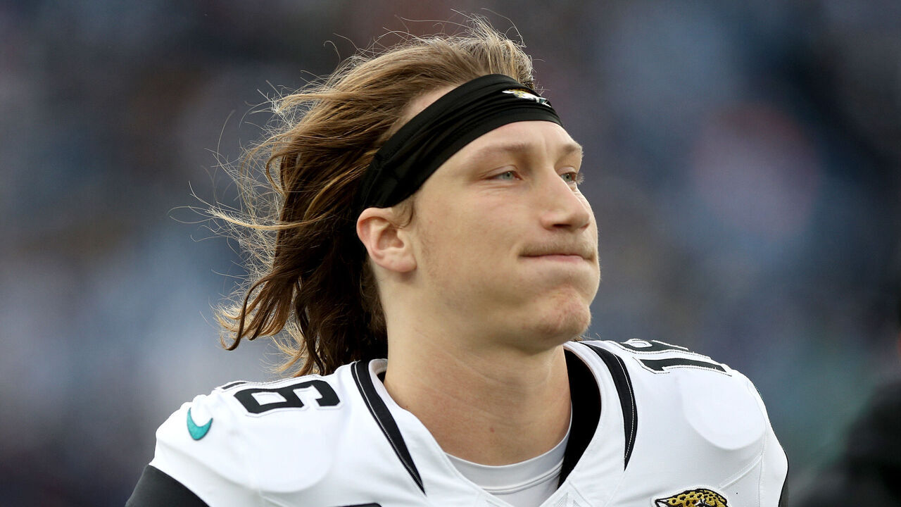 NASHVILLE, TENNESSEE - JANUARY 07: Trevor Lawrence #16 of the Jacksonville Jaguars runs off the field during halftime against the Tennessee Titans at Nissan Stadium on January 07, 2024 in Nashville, Tennessee.