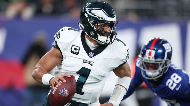 EAST RUTHERFORD, NEW JERSEY - JANUARY 07: Jalen Hurts #1 of the Philadelphia Eagles scrambles during the first quarter in the game against the New York Giants at MetLife Stadium on January 07, 2024 in East Rutherford, New Jersey.