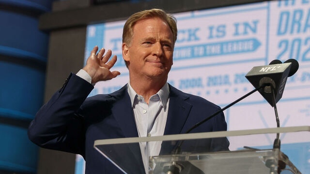KANSAS CITY, MO - APRIL 28: Commissioner Roger Goodell holds his hand to his ear as if to tell the crowd he can't hear the boos during day two of the NFL Draft on April 28, 2023 at Union Station in Kansas City, MO.