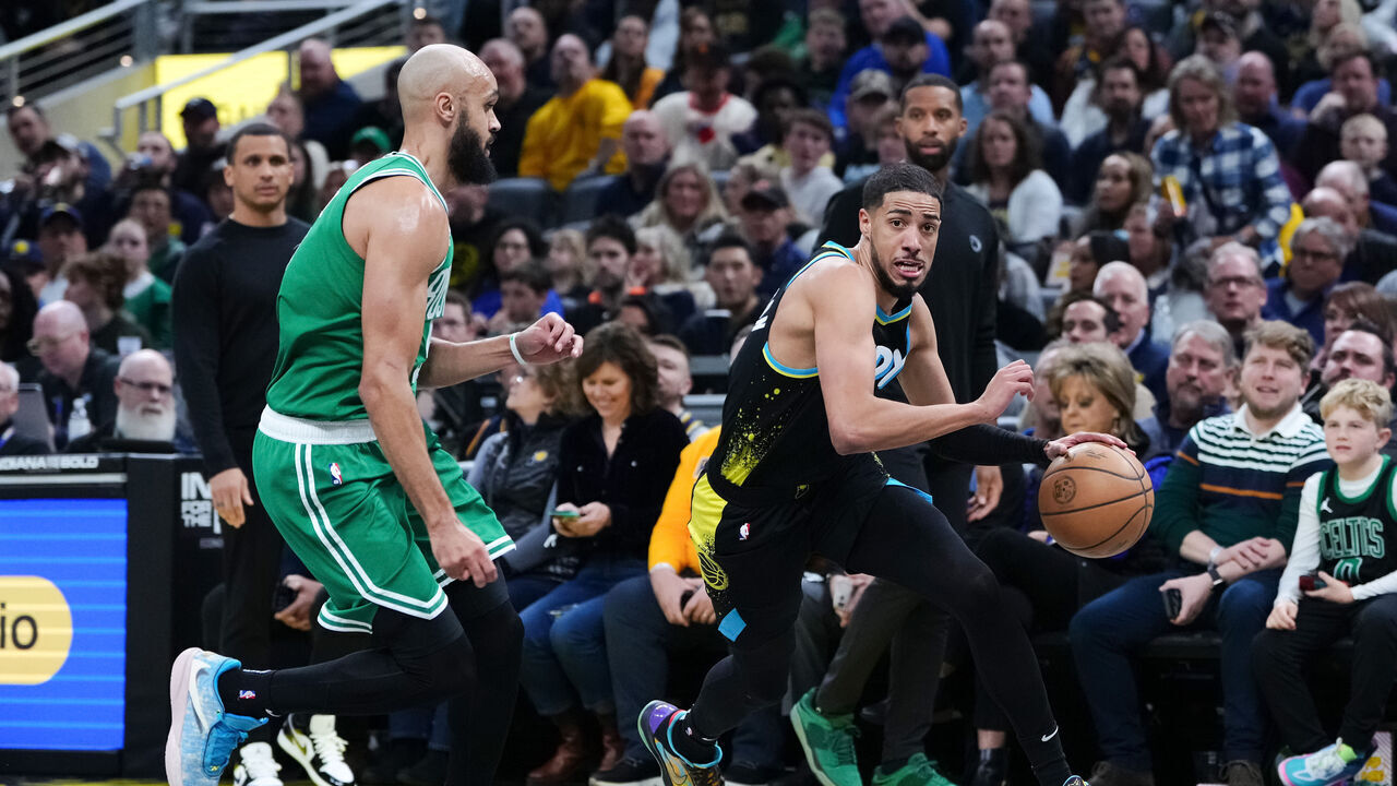 INDIANAPOLIS, INDIANA - JANUARY 06: Tyrese Haliburton #0 of the Indiana Pacers dribbles the ball while being guarded by Derrick White #9 of the Boston Celtics in the first quarter at Gainbridge Fieldhouse on January 06, 2024 in Indianapolis, Indiana.