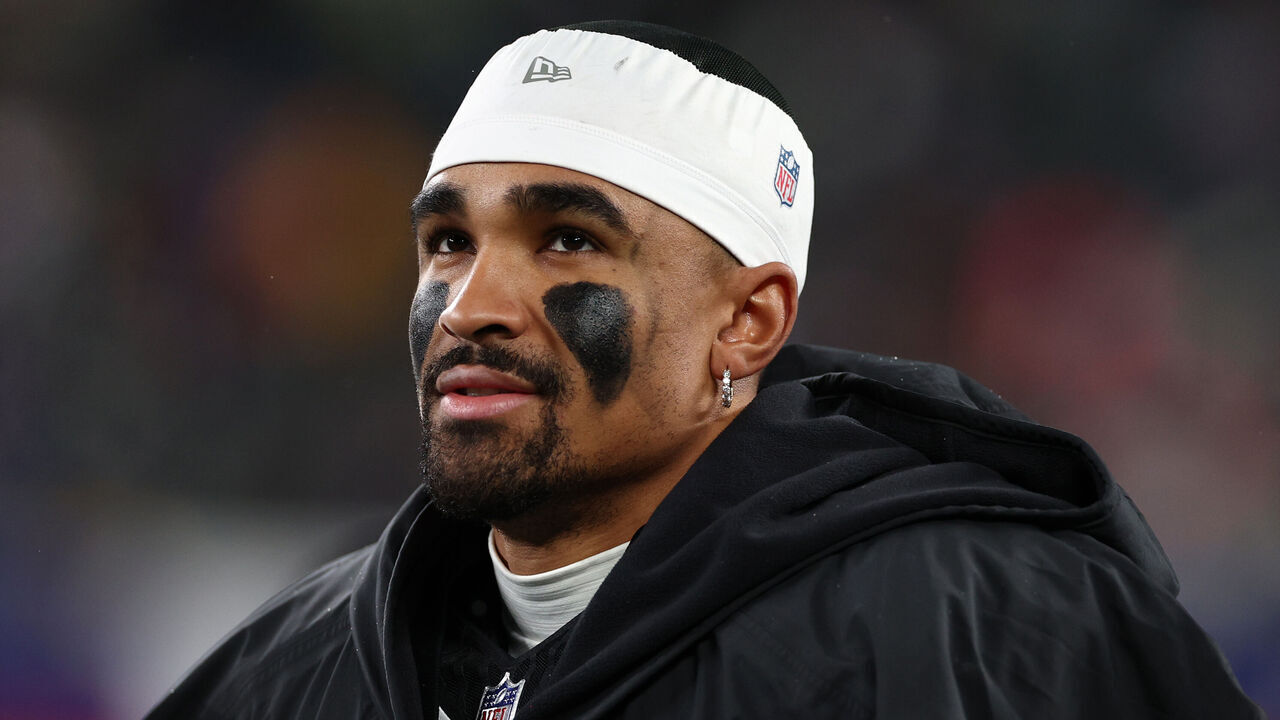 EAST RUTHERFORD, NEW JERSEY - JANUARY 07: Jalen Hurts #1 of the Philadelphia Eagles looks on from the sidelines during the second half in the game against the New York Giants at MetLife Stadium on January 07, 2024 in East Rutherford, New Jersey.