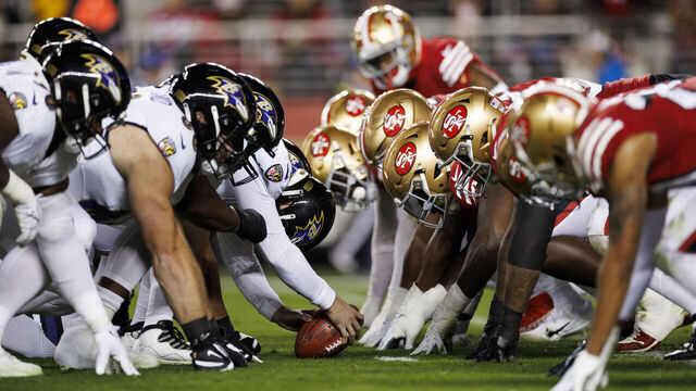 SANTA CLARA, CALIFORNIA - DECEMBER 25: The Baltimore Ravens offense gets set at the line of scrimmage against the San Francisco 49ers defense prior to the snap during an NFL football game against the San Francisco 49ers at Levi's Stadium on December 25, 2023 in Santa Clara, California.