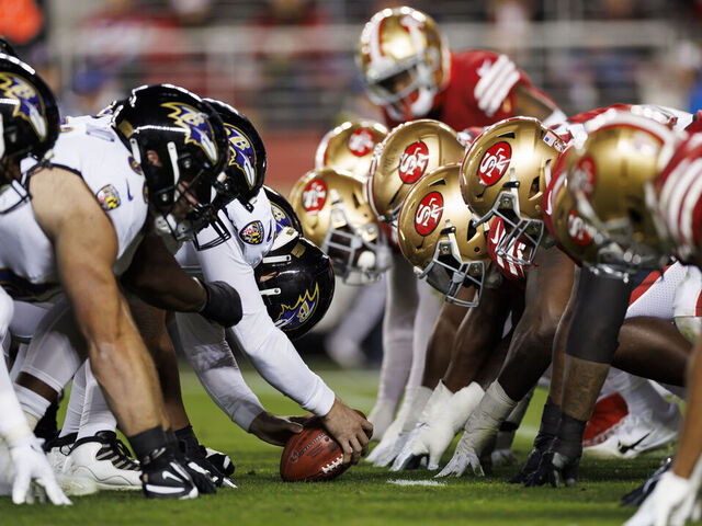 SANTA CLARA, CALIFORNIA - DECEMBER 25: The Baltimore Ravens offense gets set at the line of scrimmage against the San Francisco 49ers defense prior to the snap during an NFL football game against the San Francisco 49ers at Levi's Stadium on December 25, 2023 in Santa Clara, California.
