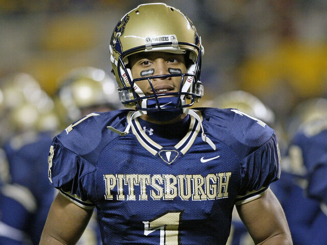 PITTSBURGH, PA - NOVEMBER 8: Wide receiver Larry Fitzgerald #1 of the University of Pittsburgh Panthers leads the team on to the field before a college football game against the Virginia Tech Hokies at Heinz Field on November 8, 2003 in Pittsburgh, Pennsylvania. The Pitt Panthers defeated Virginia Tech 31-28.