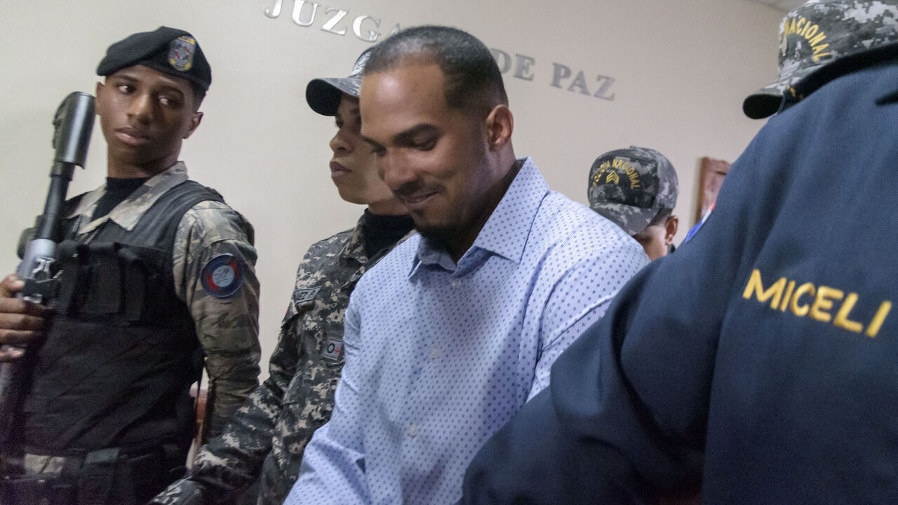 Tampa Bay Rays Dominican baseball shortstop Wander Franco, who faces an accusation of molesting an underage girl, leaves court under heavy escort in Puerto Plata, Dominican Republic, on January 5, 2024. The hearing was being held behind closed doors and Franco, 22, who is eligible for the Major League Baseball All-Star Game in the 2023 season, did not make a statement before entering. The baseball player and the mother of the 15-year-old girl were charged with "the crimes of commercial sexual exploitation and money laundering."