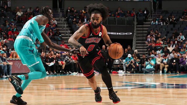 CHARLOTTE, NC - JANUARY 8: Coby White #0 of the Chicago Bulls drives to the basket during the game against the Charlotte Hornets on January 8, 2024 at Spectrum Center in Charlotte, North Carolina. Mandatory Copyright Notice: Copyright 2024 NBAE
