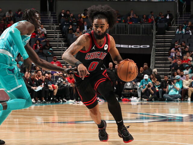 CHARLOTTE, NC - JANUARY 8: Coby White #0 of the Chicago Bulls drives to the basket during the game against the Charlotte Hornets on January 8, 2024 at Spectrum Center in Charlotte, North Carolina. Mandatory Copyright Notice: Copyright 2024 NBAE