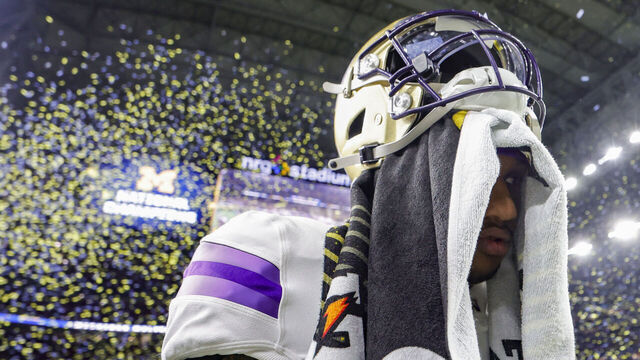 HOUSTON, TEXAS - JANUARY 08: Michael Penix Jr. #9 of the Washington Huskies walks off the field after being defeated by the Michigan Wolverines during the 2024 CFP National Championship game at NRG Stadium on January 08, 2024 in Houston, Texas. Michigan defeated Washington 34-13.