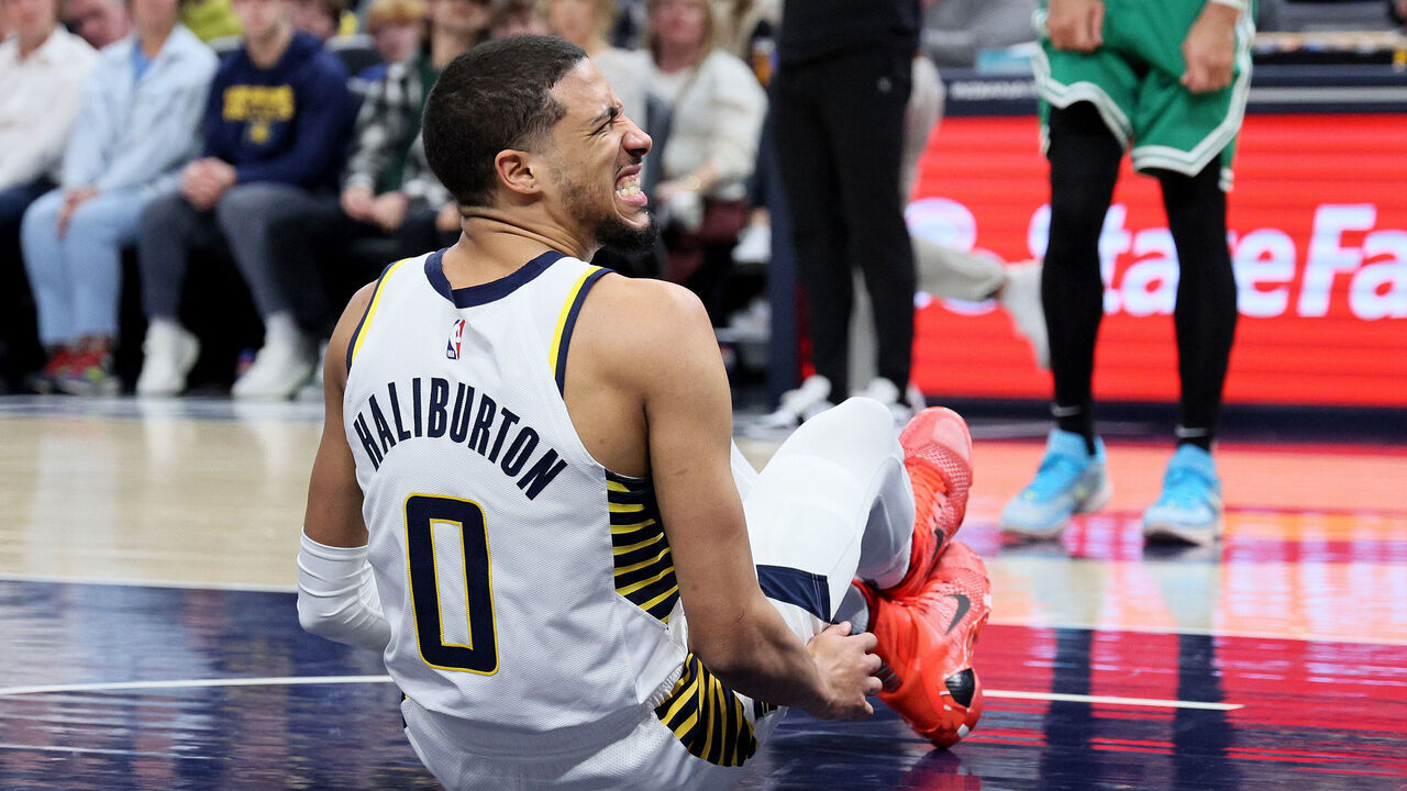 INDIANAPOLIS, INDIANA - JANUARY 08: Tyrese Haliburton #0 of the Indiana Pacers grimaces after injuring his leg in the first half against the Boston Celtics at Gainbridge Fieldhouse on January 08, 2024 in Indianapolis, Indiana.