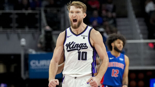 DETROIT, MICHIGAN - JANUARY 09: Domantas Sabonis #10 of the Sacramento Kings celebrates against the Detroit Pistons during the third quarter at Little Caesars Arena on January 09, 2024 in Detroit, Michigan.