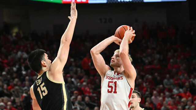 LINCOLN, NEBRASKA - JANUARY 9: Rienk Mast #51 of the Nebraska Cornhuskers scores over Zach Edey #15 of the Purdue Boilermakers in the first half at Pinnacle Bank Arena on January 9, 2024 in Lincoln, Nebraska.