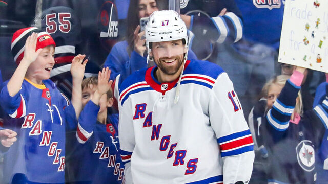 WINNIPEG, CANADA - OCTOBER 30: Blake Wheeler #17 of the New York Rangers is all smiles during the pre-game warm up as young fans cheer him on prior to NHL action against the Winnipeg Jets at the Canada Life Centre on October 30, 2023 in Winnipeg, Manitoba, Canada.