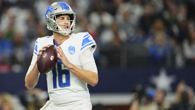 ARLINGTON, TX - DECEMBER 30: Jared Goff #16 of the Detroit Lions drops back to pass against the Dallas Cowboys during the first half at AT&T Stadium on December 30, 2023 in Arlington, Texas.