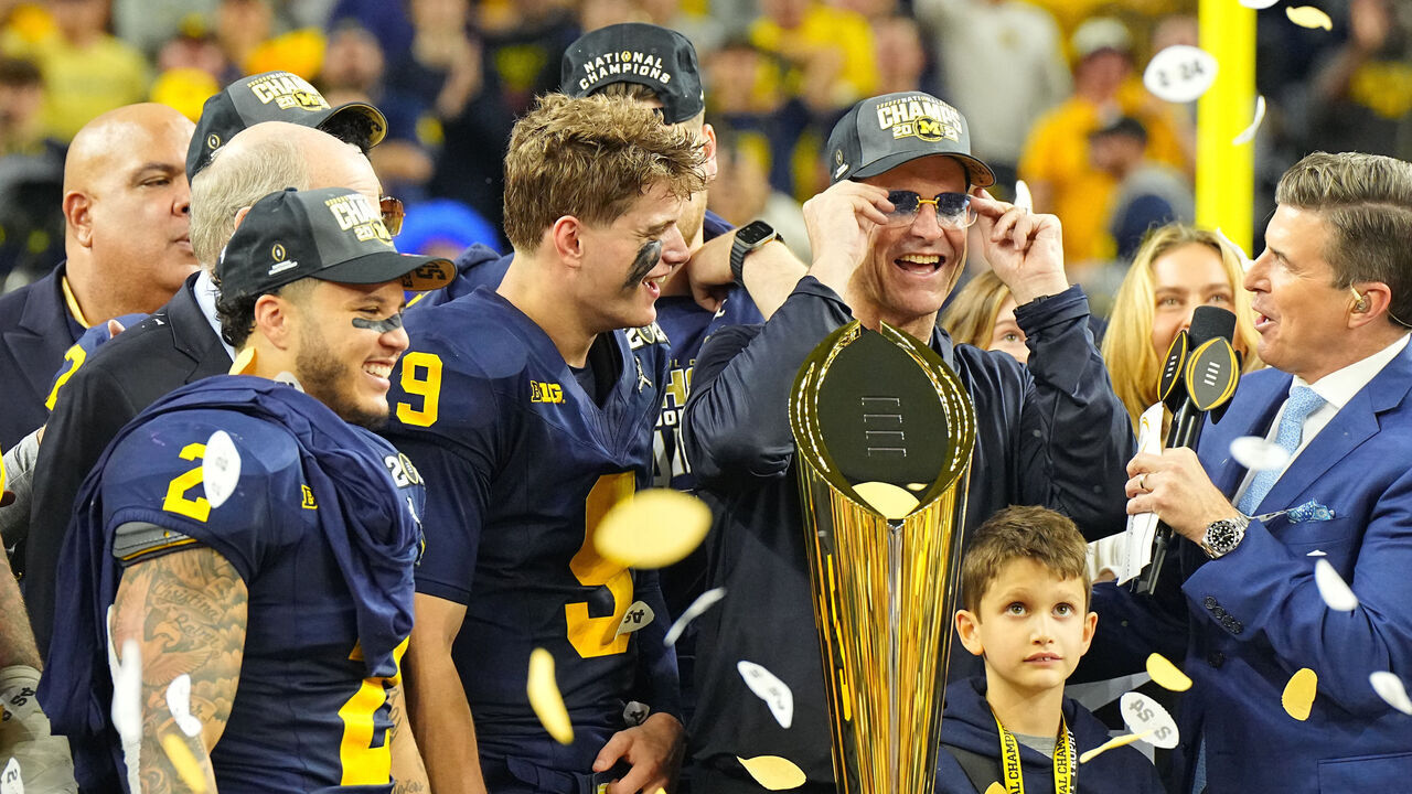 College Football: CFP National Championship: ESPN broadcaster Rece Davis interviews Michigan Blake Corum (2) , JJ McCarthy (9), and head coach Jim Harbaugh after victory vs Washington at NRG Stadium. Houston, TX 1/8/2024 CREDIT: Erick W. Rasco (Set Number: X164476 TK1)