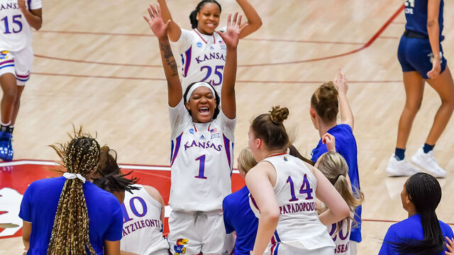 PALO ALTO, CA - MARCH 18: Kansas Jayhawks center Taiyanna Jackson (1) celebrates with teammates their win in the 1st Round of playoffs between the Georgia Tech Yellow Jackets and the Kansas Jayhawks on Friday, March 18, 2022 at Maples Pavilion in Palo Alto, California.