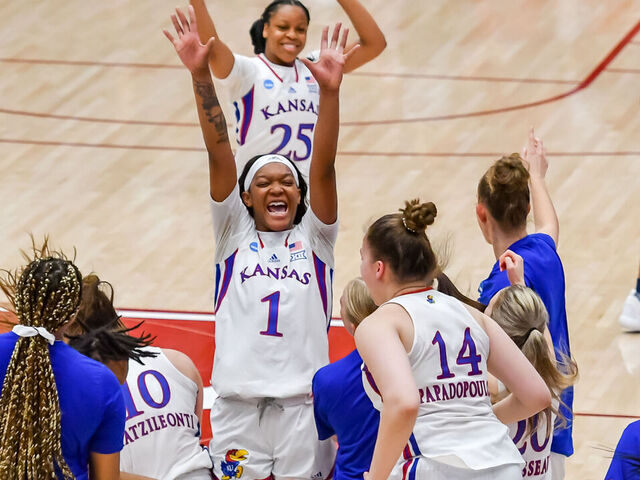 PALO ALTO, CA - MARCH 18: Kansas Jayhawks center Taiyanna Jackson (1) celebrates with teammates their win in the 1st Round of playoffs between the Georgia Tech Yellow Jackets and the Kansas Jayhawks on Friday, March 18, 2022 at Maples Pavilion in Palo Alto, California.