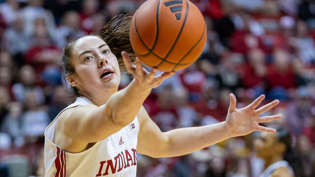 BLOOMINGTON, INDIANA - JANUARY 10: Mackenzie Holmes #54 of the Indiana Hoosiers reaches for the ball during the second half against the Penn State Nittany Lions at Simon Skjodt Assembly Hall on January 10, 2024 in Bloomington, Indiana.