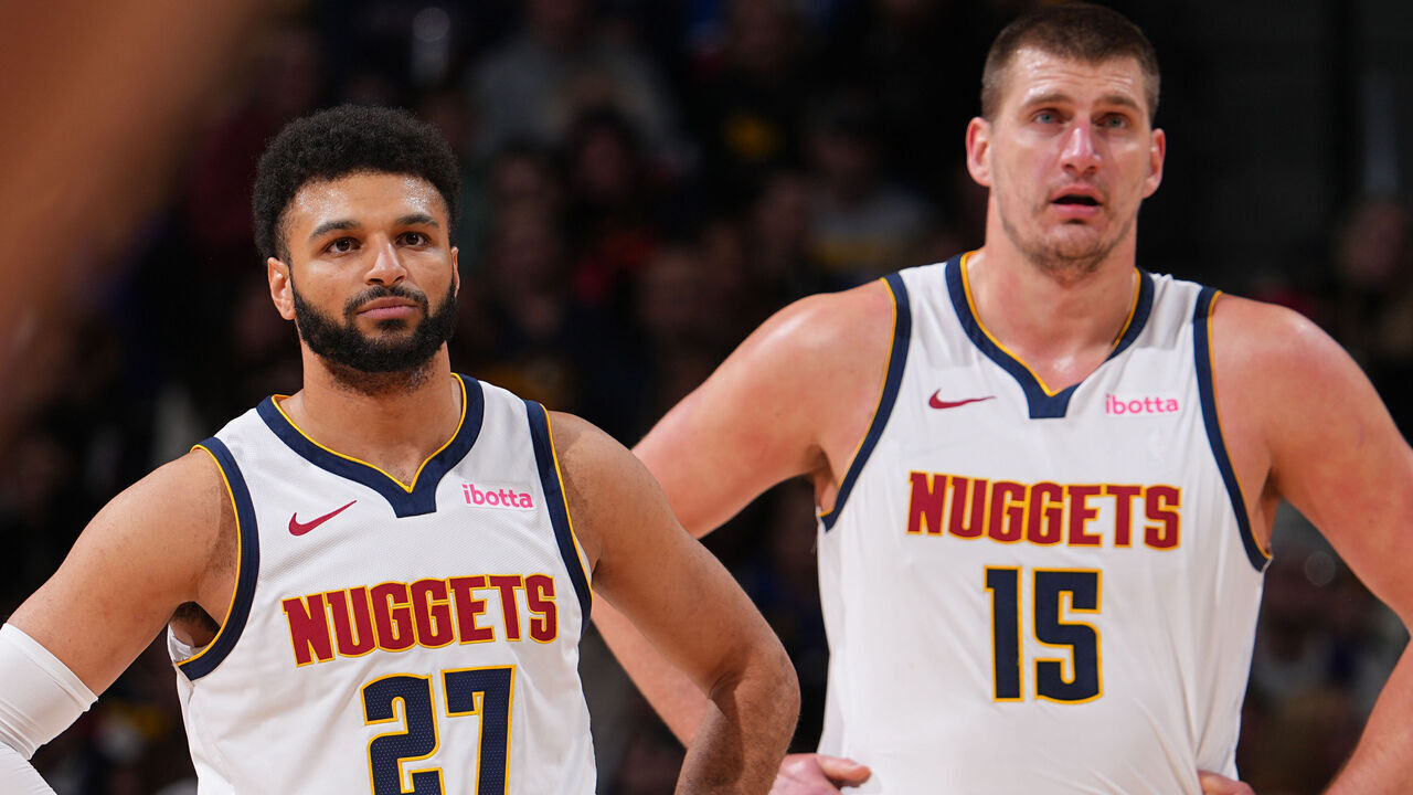 DENVER, CO - DECEMBER 29: Jamal Murray #27 and Nikola Jokic #15 of the Denver Nuggets looks on during the game against the Oklahoma City Thunder on December 29, 2023 at the Ball Arena in Denver, Colorado. NOTE TO USER: User expressly acknowledges and agrees that, by downloading and/or using this Photograph, user is consenting to the terms and conditions of the Getty Images License Agreement. Mandatory Copyright Notice: Copyright 2023 NBAE