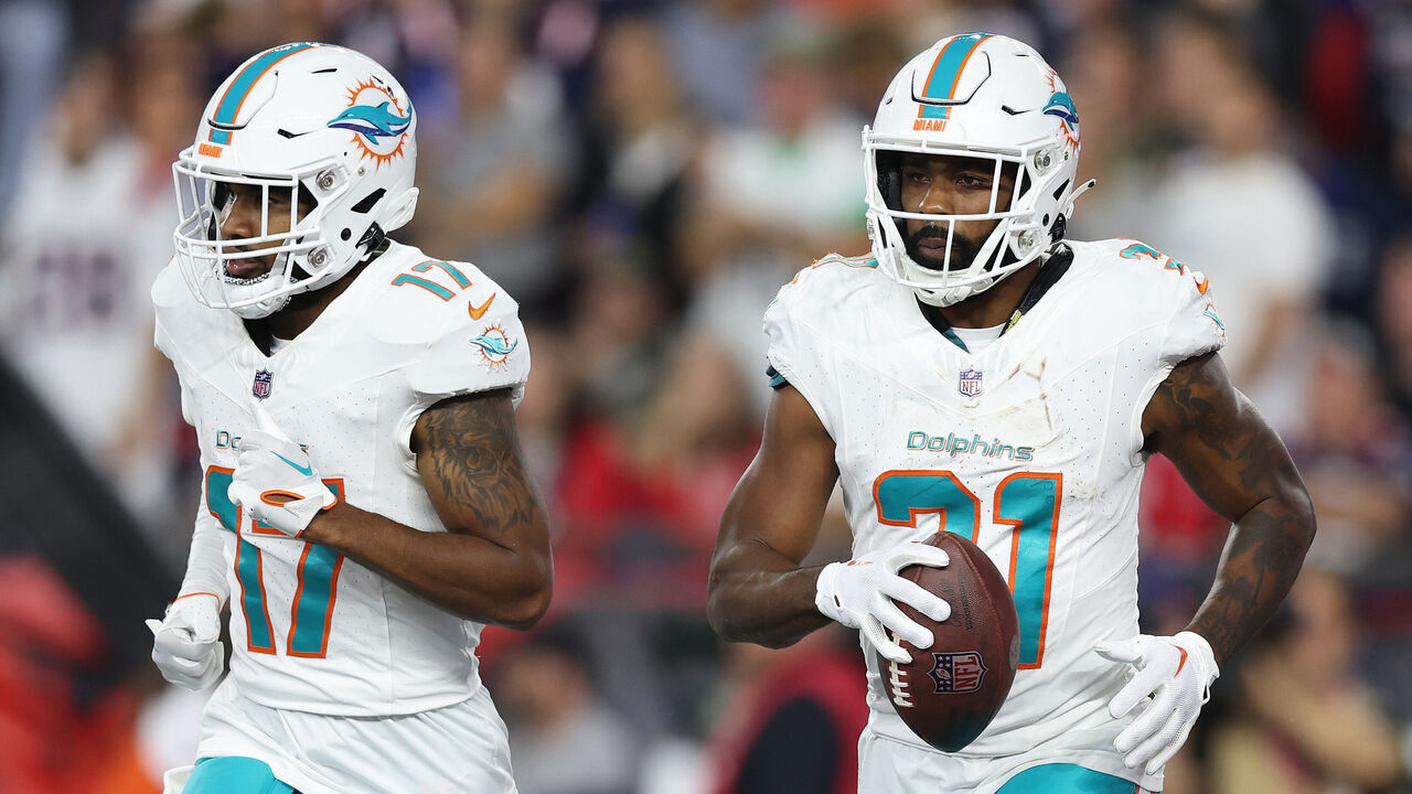 FOXBOROUGH, MASSACHUSETTS - SEPTEMBER 17: Jaylen Waddle #17 and Raheem Mostert #31 of the Miami Dolphins react during the game against the New England Patriots at Gillette Stadium on September 17, 2023 in Foxborough, Massachusetts.