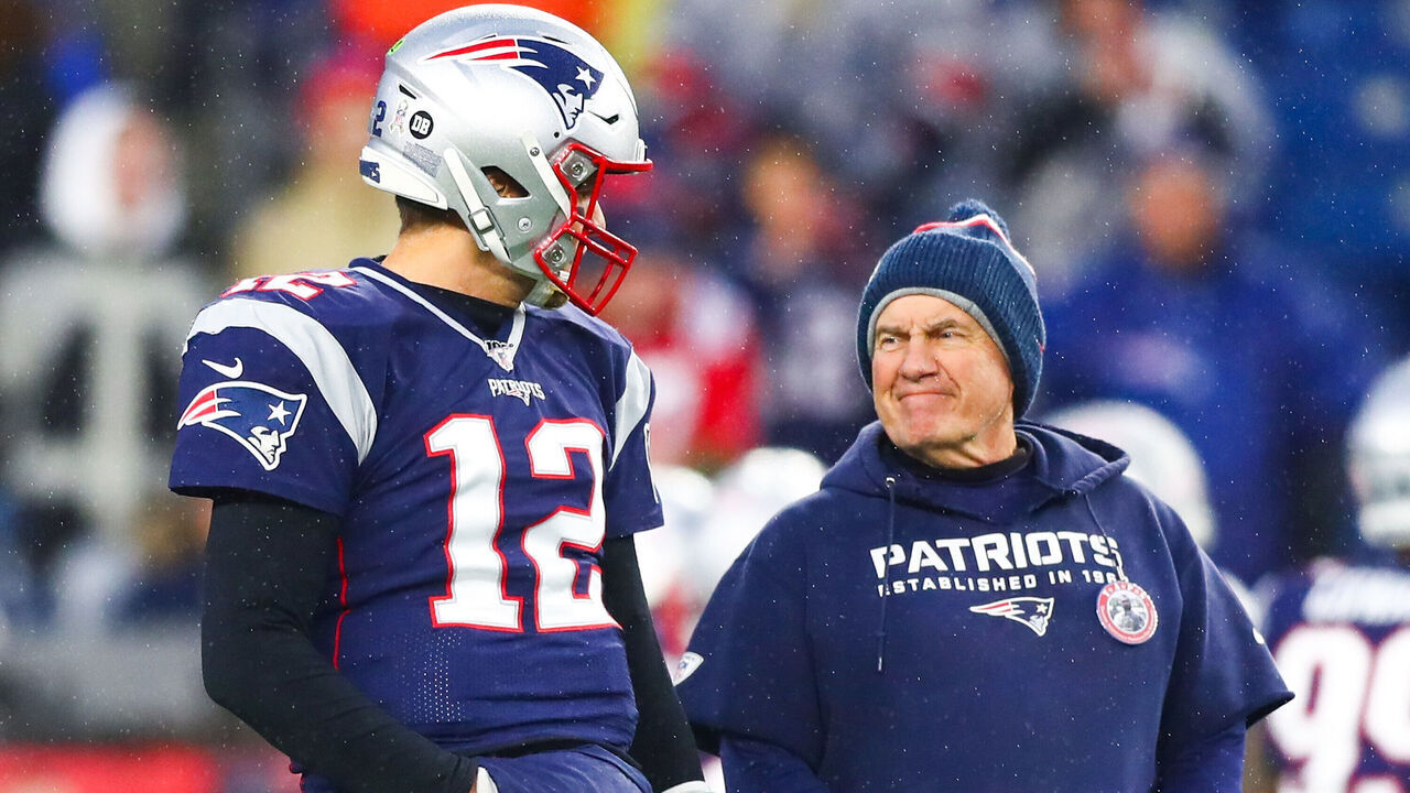 FOXBOROUGH, MA - NOVEMBER 24: Tom Brady #12 talks to head coach Bill Belichick of the New England Patriots before a game against the Dallas Cowboys at Gillette Stadium on November 24, 2019 in Foxborough, Massachusetts.