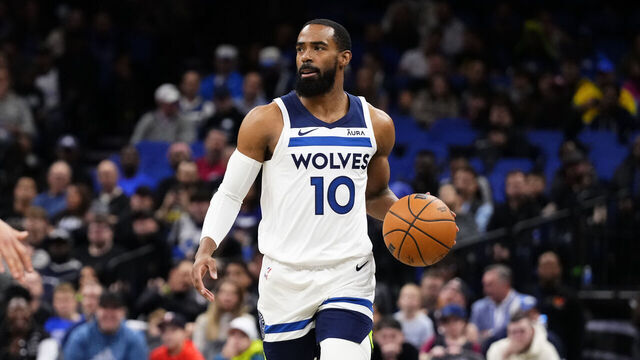 ORLANDO, FLORIDA - JANUARY 09: Mike Conley #10 of the Minnesota Timberwolves dribbles the ball down court against the Orlando Magic during the first quarter at Kia Center on January 09, 2024 in Orlando, Florida.