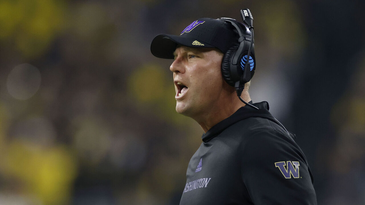 HOUSTON, TX - JANUARY 08: Washington Huskies head coach Kalen DeBoer reacts during the CFP National Championship against the Michigan Wolverines on January 08, 2024 at NRG Stadium in Houston, Texas.