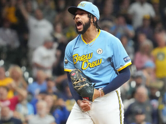MILWAUKEE, WISCONSIN - SEPTEMBER 15: Devin Williams #38 of the Milwaukee Brewers celebrates striking out a batter during the ninth inning against the Washington Nationals at American Family Field on September 15, 2023 in Milwaukee, Wisconsin.