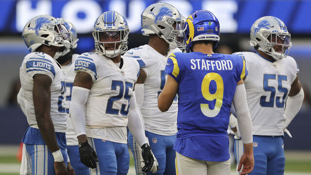 INGLEWOOD, CALIFORNIA - OCTOBER 24: Matthew Stafford #9 of the Los Angeles Rams talks to former teammates during the fourth quarter against the Detroit Lions at SoFi Stadium on October 24, 2021 in Inglewood, California.