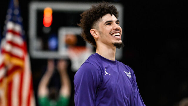 CHARLOTTE, NORTH CAROLINA - OCTOBER 19: LaMelo Ball #1 of the Charlotte Hornets smiles prior to his preseason game against the Boston Celtics at Spectrum Center on October 19, 2023 in Charlotte, North Carolina.