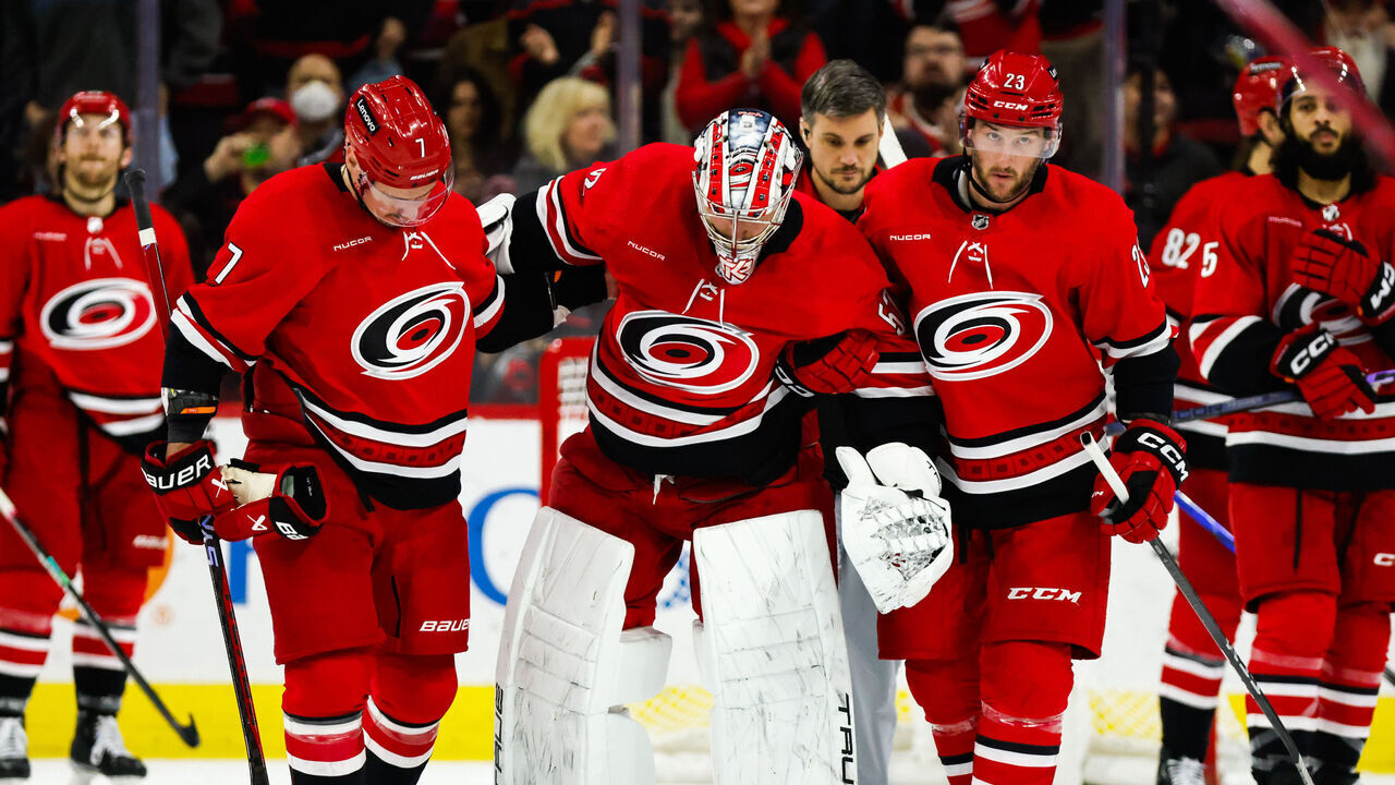 RALEIGH, NC - JANUARY 11: Pyotr Kochetkov #52 of the Carolina Hurricanes leaves the ice injured during the second period of the game against the Anaheim Ducks at PNC Arena on January 11, 2024 in Raleigh, North Carolina.