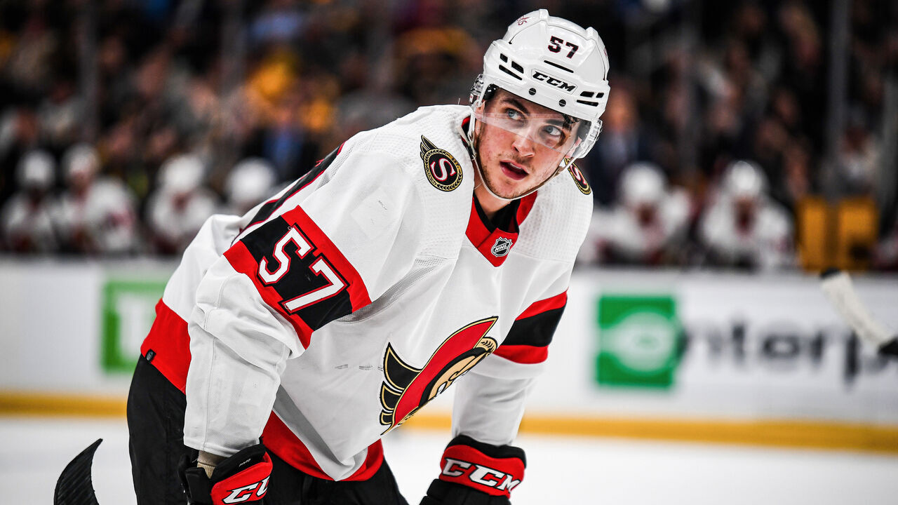 BOSTON, MASSACHUSETTS - MARCH 21: Shane Pinto #57 of the Ottawa Senators prepares for a face-off against the Boston Bruins in the second period at TD Garden on March 21, 2023 in Boston, Massachusetts.