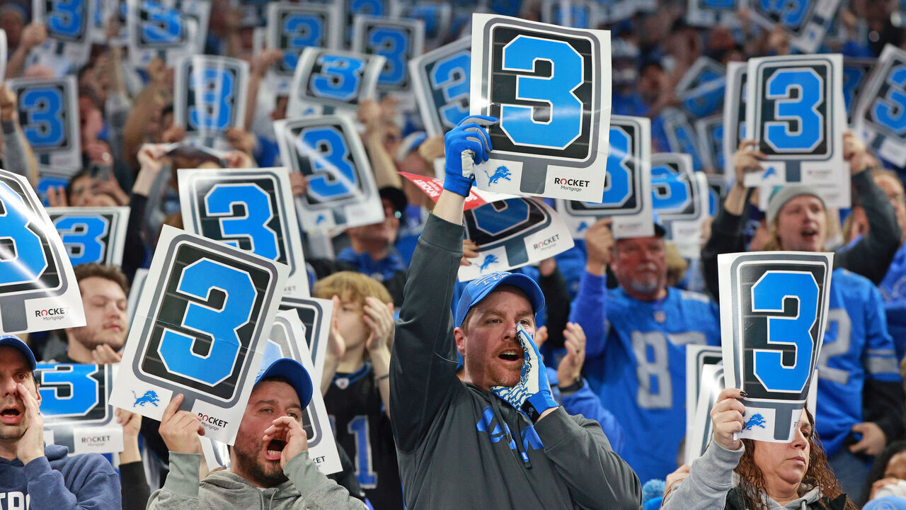 Detroit Lions fans hold third down placards during the second half of an NFL football game between the Minnesota Vikings and the Detroit Lions in Detroit, Michigan USA, on Sunday, January 7, 2024.