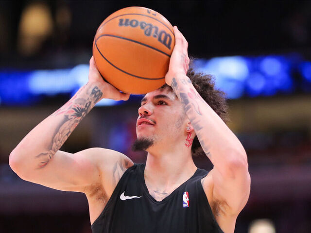 CHICAGO, IL - JANUARY 05: LaMelo Ball #1 of the Charlotte Hornets shoots the ball prior to a game against the Chicago Bulls at United Center on January 05, 2024 in Chicago, Illinois.