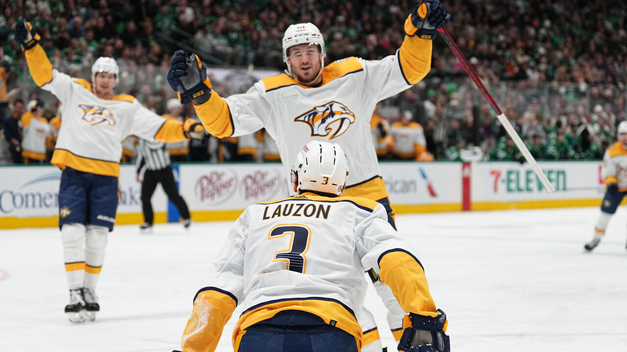 DALLAS, TX - JANUARY 12: Jeremy Lauzon #3 of the Nashville Predators celebrate a goal with team against the Dallas Stars at the American Airlines Center on January 12, 2024 in Dallas, Texas.
