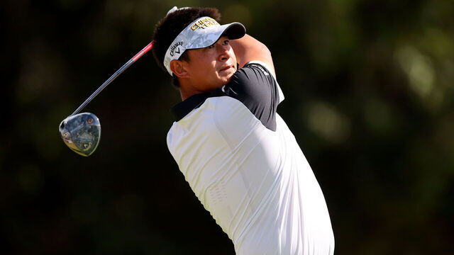 HONOLULU, HAWAII - JANUARY 12: Carl Yuan of China plays his shot from the 16th tee during the second round of the Sony Open in Hawaii at Waialae Country Club on January 12, 2024 in Honolulu, Hawaii.