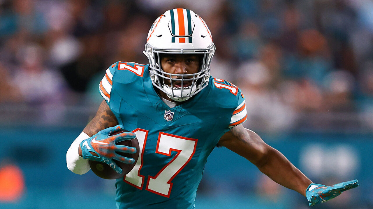 MIAMI GARDENS, FLORIDA - DECEMBER 24: Jaylen Waddle #17 of the Miami Dolphins runs the ball during the fourth quarter in the game against the Dallas Cowboys at Hard Rock Stadium on December 24, 2023 in Miami Gardens, Florida.