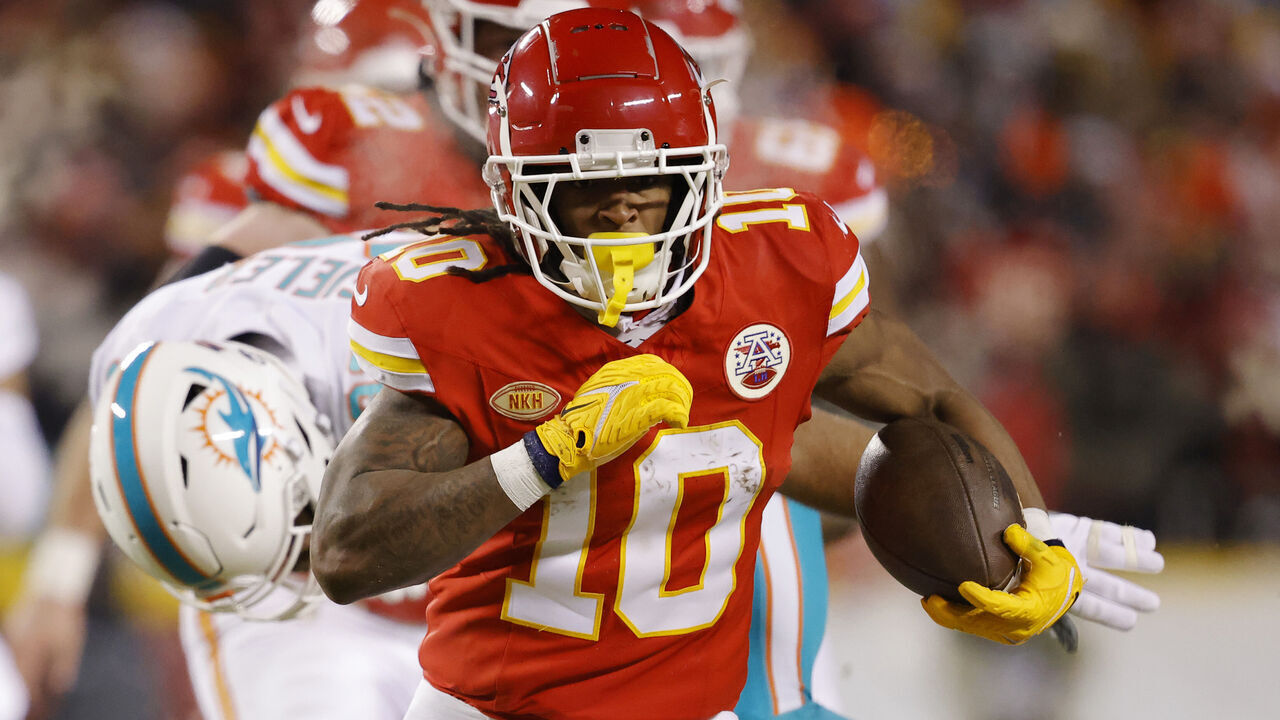 KANSAS CITY, MISSOURI - JANUARY 13: Isiah Pacheco #10 of the Kansas City Chiefs carries the ball during the first half against the Miami Dolphins in the AFC Wild Card Playoffs at GEHA Field at Arrowhead Stadium on January 13, 2024 in Kansas City, Missouri.