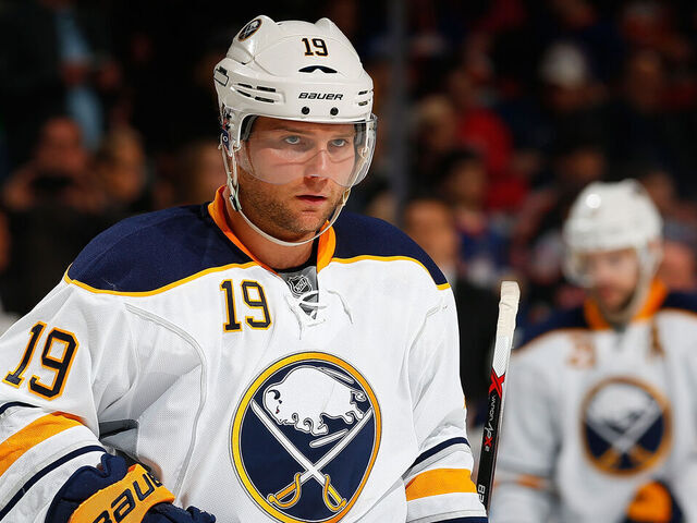 UNIONDALE, NY - MARCH 15: Cody Hodgson #19 of the Buffalo Sabres skates against the New York Islanders at Nassau Veterans Memorial Coliseum on March 15, 2014 in Uniondale, New York. The Islanders defeated the Sabres 4-1.