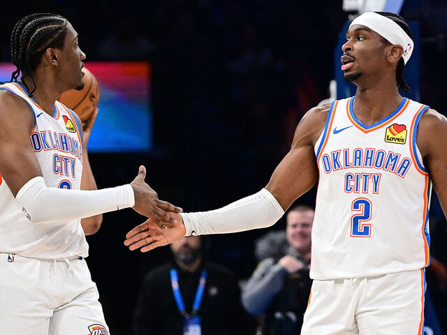 OKLAHOMA CITY, OKLAHOMA - JANUARY 13: Jalen Williams #8 and Shai Gilgeous-Alexander #2 of the Oklahoma City Thunder celebrate during the second half against the Orlando Magic at Paycom Center on January 13, 2024 in Oklahoma City, Oklahoma.