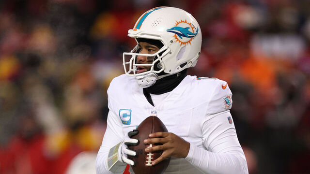 KANSAS CITY, MISSOURI - JANUARY 13: Tua Tagovailoa #1 of the Miami Dolphins looks to pass during the first half against the Kansas City Chiefs in the AFC Wild Card Playoffs at GEHA Field at Arrowhead Stadium on January 13, 2024 in Kansas City, Missouri.