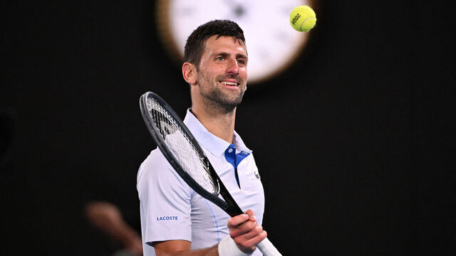 Serbia's Novak Djokovic reacts between points against Croatia's Dino Prizmic during their men's singles match on day one of the Australian Open tennis tournament in Melbourne on January 14, 2024.